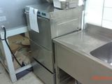an image of a commercial kitchen with stainless steel appliances