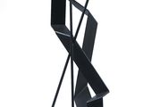 an image of a black metal sculpture on a white background