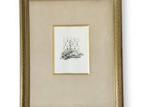 a framed drawing of a cat laying on the ground in front of a white background