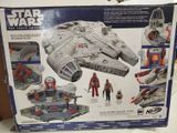 the box is open to show the contents of the star wars millennium fighter set