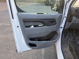 a car door open with the driver ' s side door open