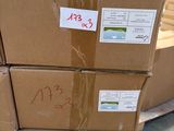 boxes stacked on top of each other in a warehouse area
