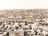 a black and white photo of an old town