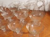 a lot of empty wine glasses sitting on a table