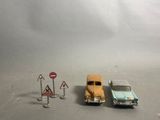 three toy cars that are sitting next to each other