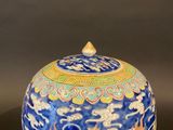 an image of a blue and white vase with a dragon on it
