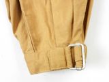 beige pants with a metal buckle on a white background