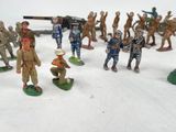 a lot of figurines that are sitting on a table