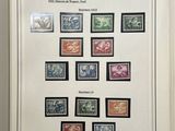 an open book with a picture of stamps on it