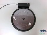 a black robot that is sitting on a table