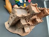 a small model of a castle on top of a table