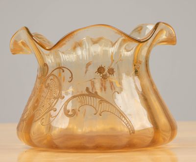 a glass vase that is sitting on a table