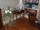 an image of a living room with a desk and a chair