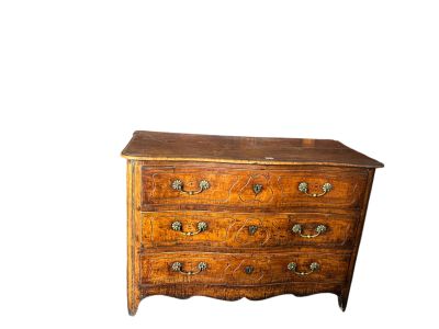 a small chest of drawers on a white background