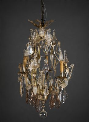 an image of a chandelier made of glass and metal