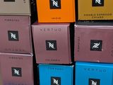 several boxes of different colors are stacked on top of each other