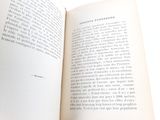 a open book with a picture of a cat on it