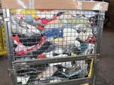 a cart full of shoes sitting in a warehouse