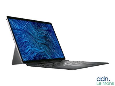 a close up of a laptop computer on a white surface