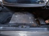 a trunk of a car that has a small compartment in it