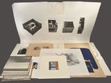 an open book with a bunch of pictures on it sitting on top of a table