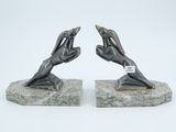 pair of art deco bookends of two hands reaching for each other
