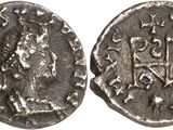une pièce d'argent portant l'image d'une femme et d'un homme