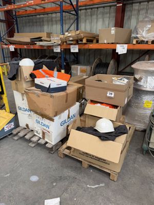 many boxes and boxes on a pallet in a warehouse