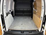 a white van that is parked in a lot