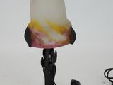 a lamp that is sitting on top of a table