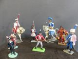 many figurines of soldiers on display on a table