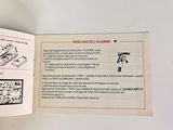 a person holding a book with instructions on it