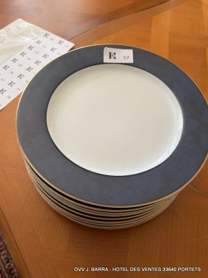 a stack of plates sitting on a table with a price tag on it