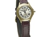 a close up of a wrist watch with roman numerals on it