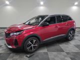 a red toyota c - hr suv parked on a checkered floor