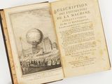an open book with a drawing of a hot air balloon in the middle