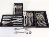 silverware in a black box with spoons and spoons in it