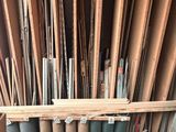 a lot of different types of wood in the warehouse