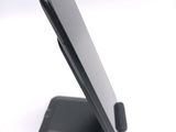 a close up of a cell phone on a stand