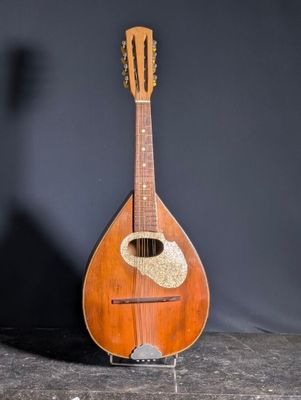 a small guitar that is sitting on a table