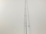 a black and white photo of a pole with a sign on it