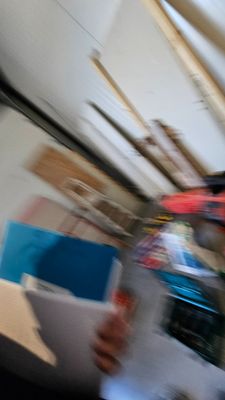 a blurry photo of a man riding a skateboard