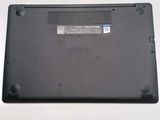 a close up of a laptop on a white surface