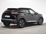 the rear view of a black 2020 nissan cx - hr
