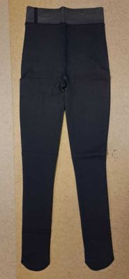 a close up of a pair of black pants on a floor