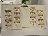 a picture of a display of gold and silver rings