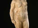 statue of a woman holding her head in her hands
