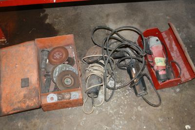 a red box with some electrical equipment on the floor