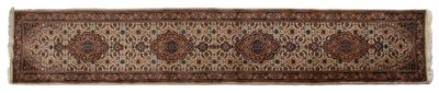 a close up of a brown and black rug on a white background