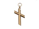 gros plan d'une croix sur une chaîne sur fond blanc